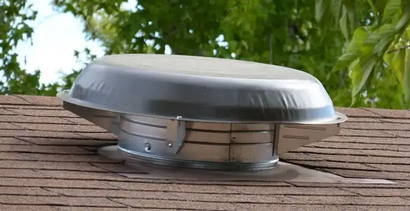 attic fan installation services with low-profile roof ventilation unit in Pasadena, CA