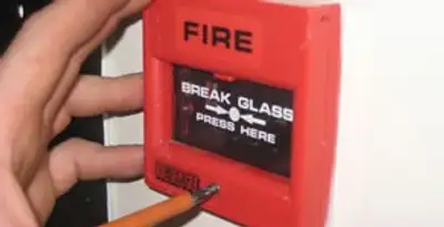 fire alarm installation service showing manual fire alarm pull station installed by licensed electricians in Pasadena, CA