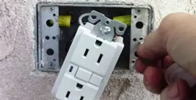 gfci circuits service showing installation of a ground fault circuit interrupter outlet by licensed electricians in Pasadena, CA