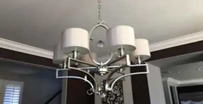 Modern chandelier installation with multiple light fixtures in Pasadena, CA