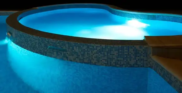 pool light installation and repair services highlighting illuminated pool interior lighting in Pasadena, CA