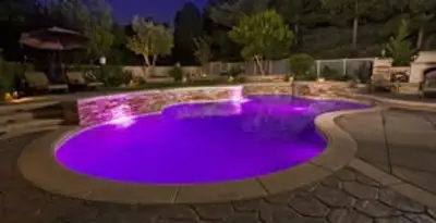 pool light installation and repair services illuminating a residential swimming pool in Pasadena, CA