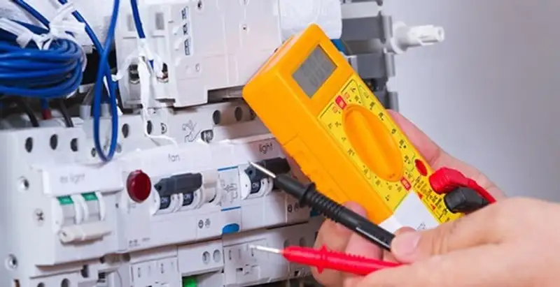 Residential electrician testing home electrical panel for safety and performance in Pasadena, CA