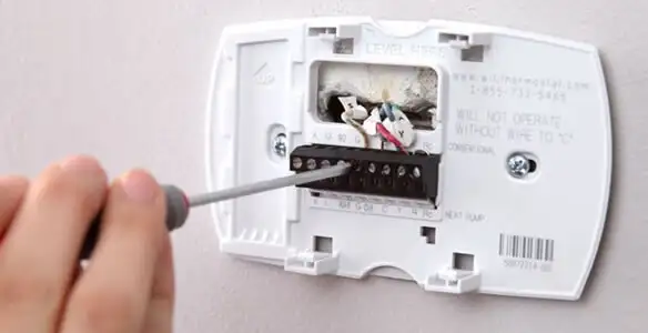 Thermostat installation service with proper wiring and secure wall mounting in Pasadena, CA